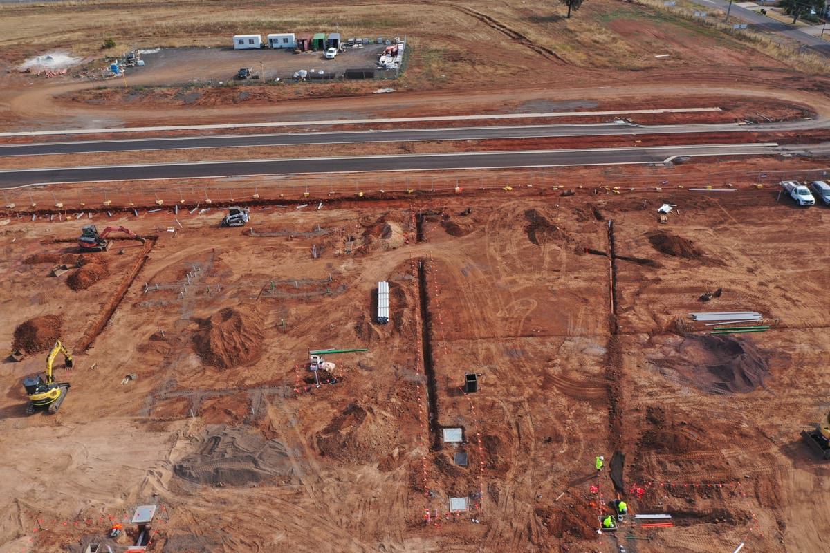 Brookfield Primary School (interim name) - construction photo of site progress in February 2023 - aerial shot of site showing dug trenches