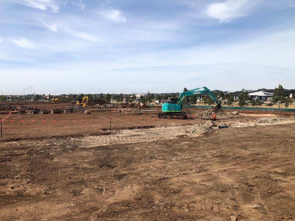 Lollypop Creek Specialist School (interim name) - construction photo of site progress in February 2023 - mechanical digger working on site