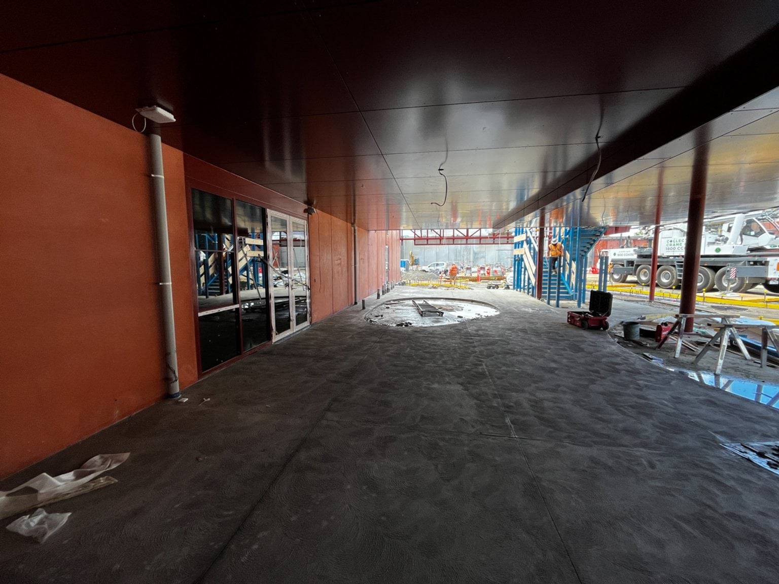 Concrete slab underneath gloss black eaves