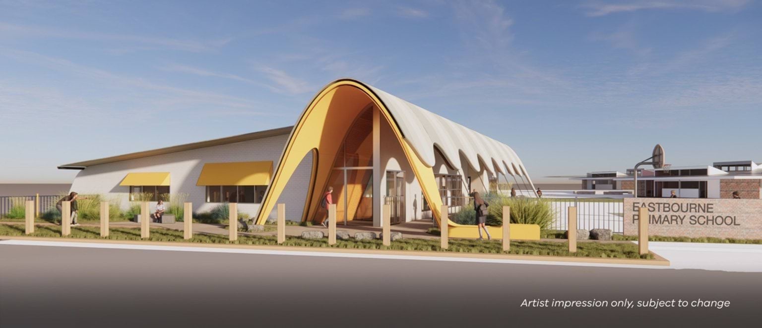 Outdoor graphic of Eastbourne Primary School. The entrance shows a modern building with an orange archway. There is a road outside and footpath.