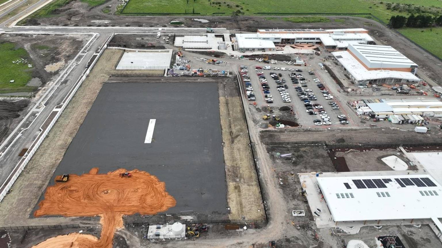 Overhead photo of area being dug out at school construction site