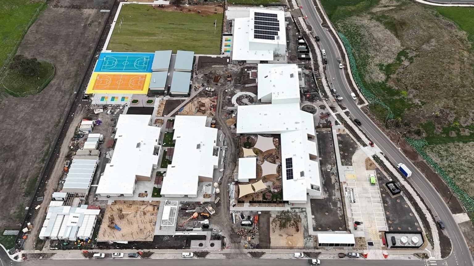 Aerial view of school complex under construction