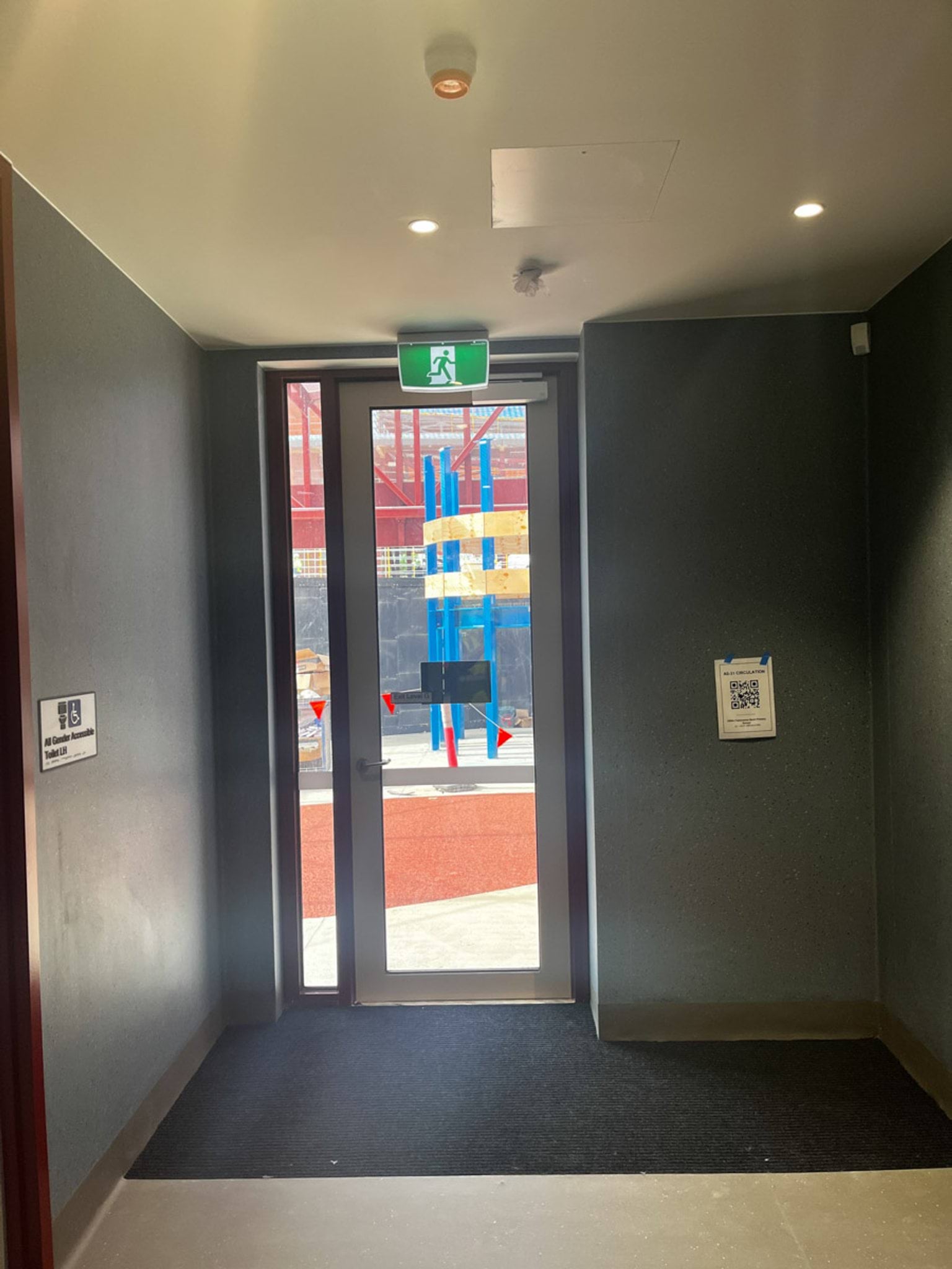 Glass door between school hall and outdoor play area