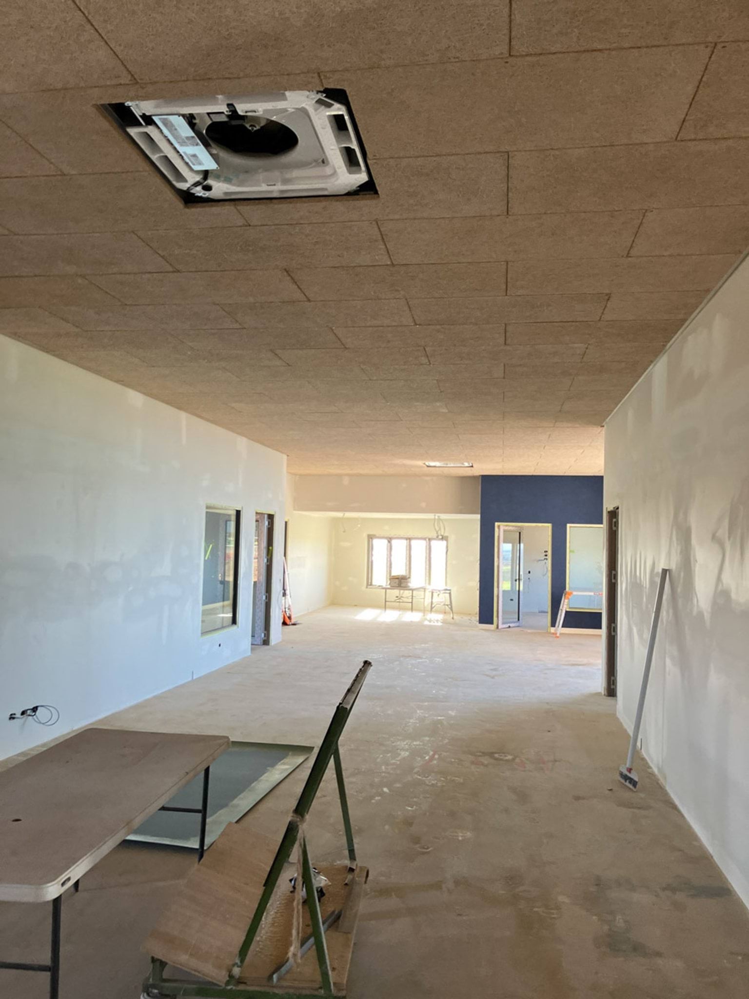 Inside school room with construction equipment