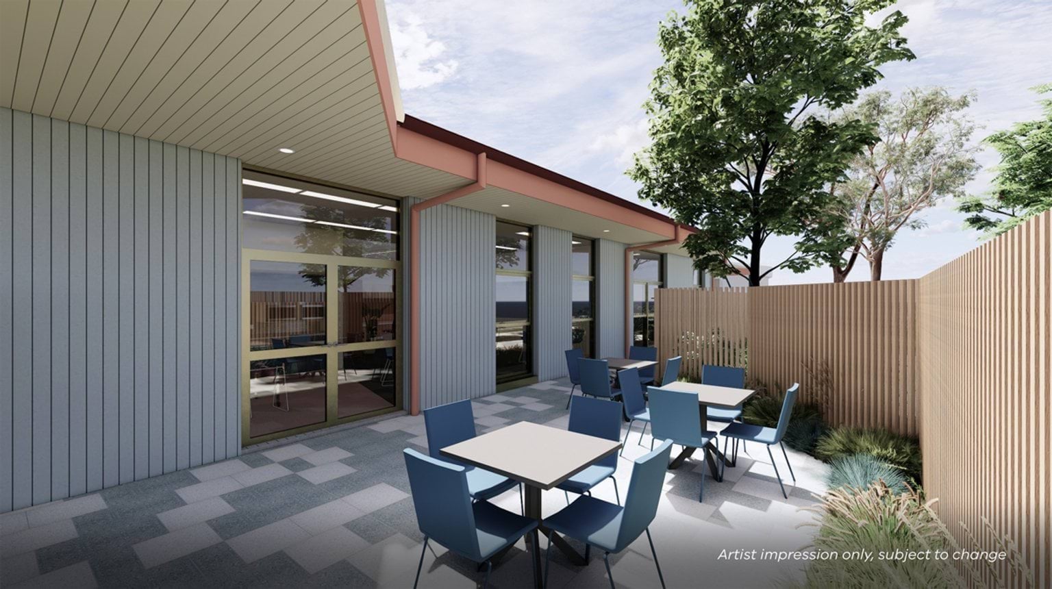 Artist impression of an outdoor courtyard with square tables and blue chairs on a paved surface, next to a building with large windows and timber fencing.