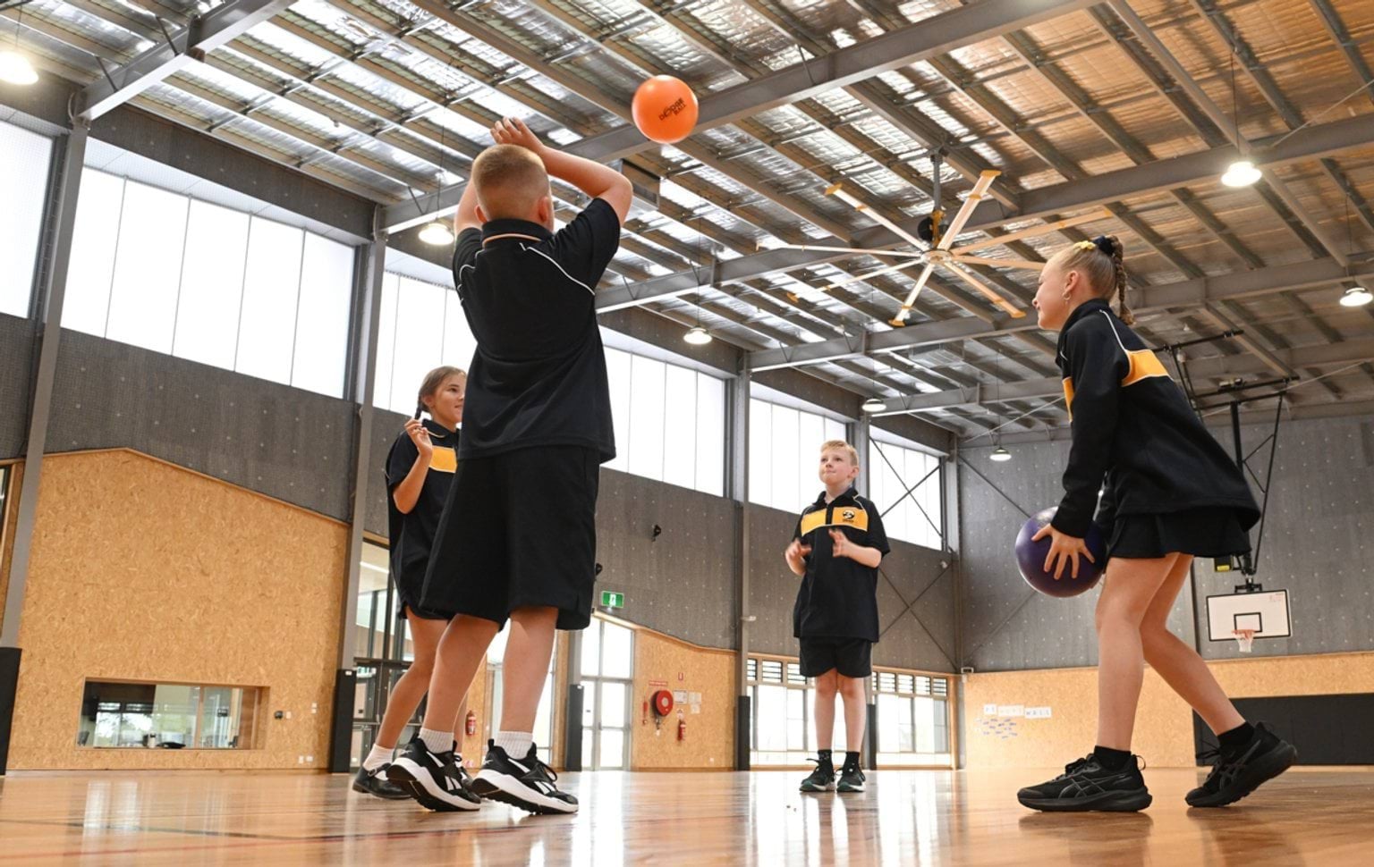Playing basketball in the gym