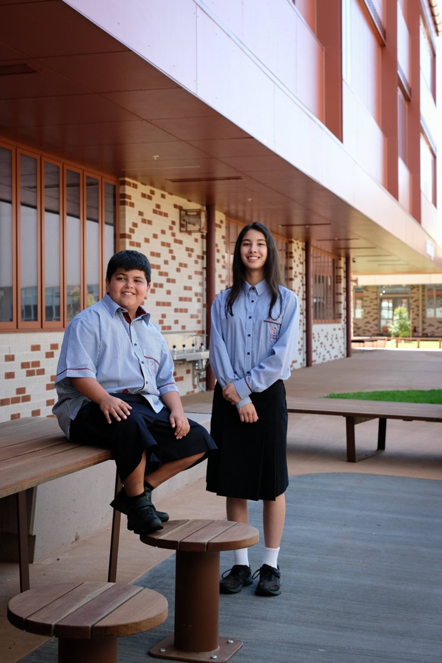Sitting together outside the learning building