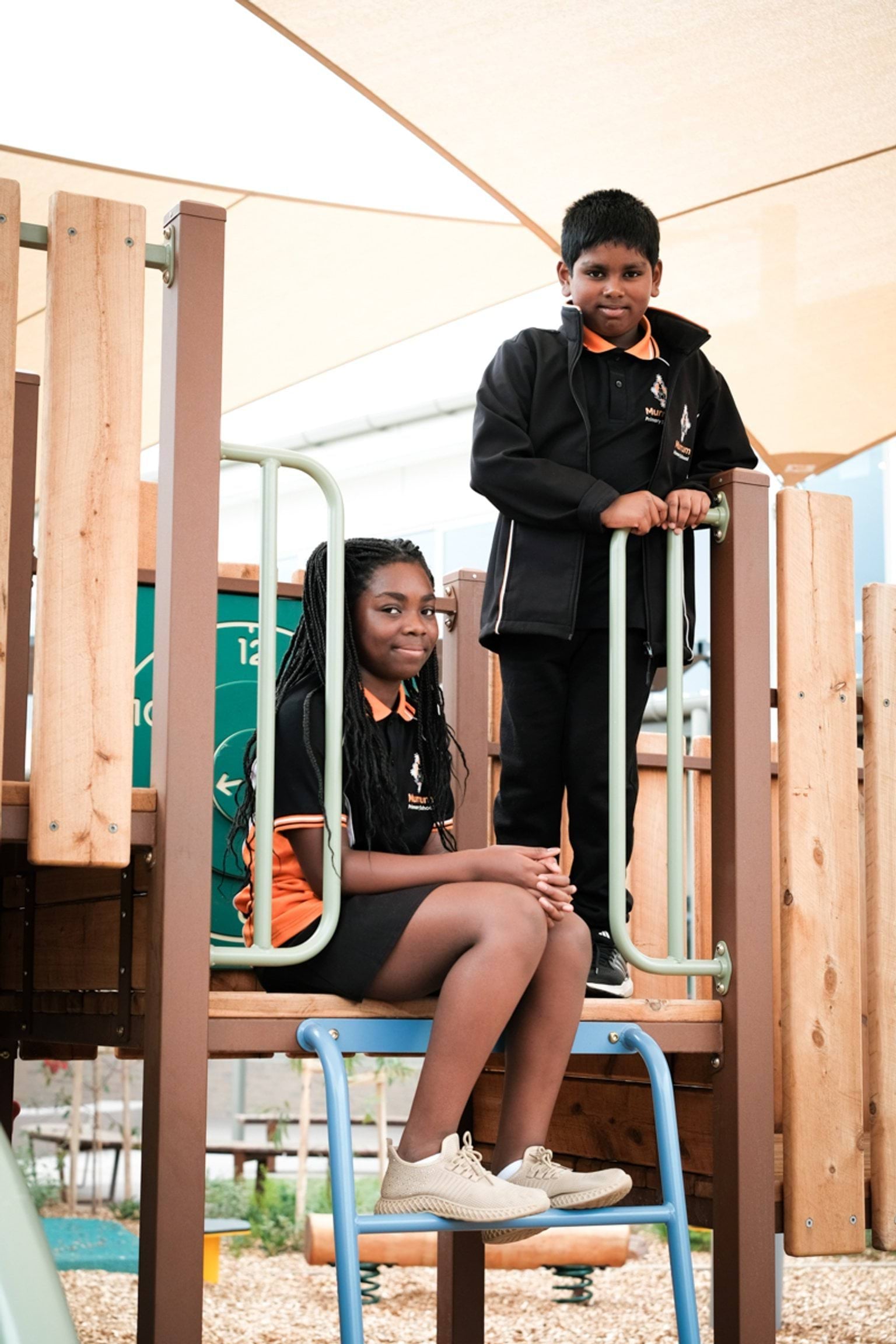 Trying out the playground equipment
