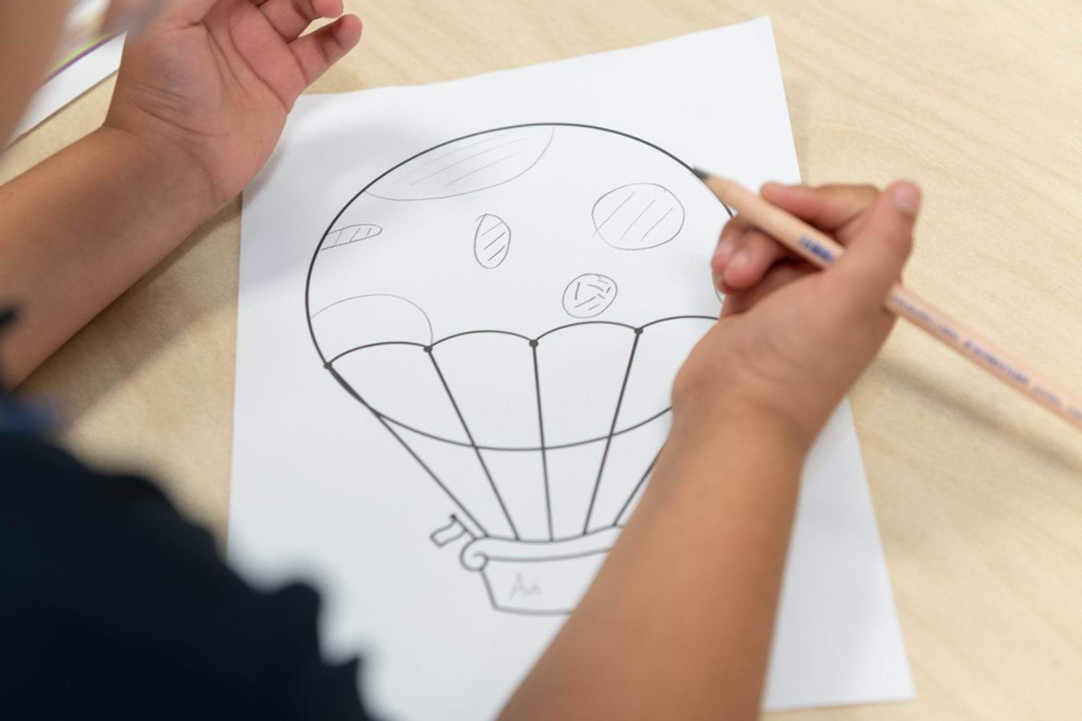 Working on a hot air balloon drawing