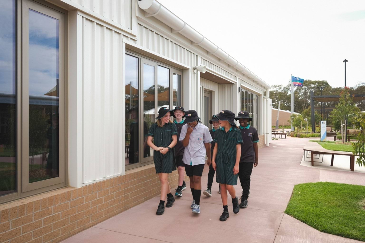 Walking together outside the school