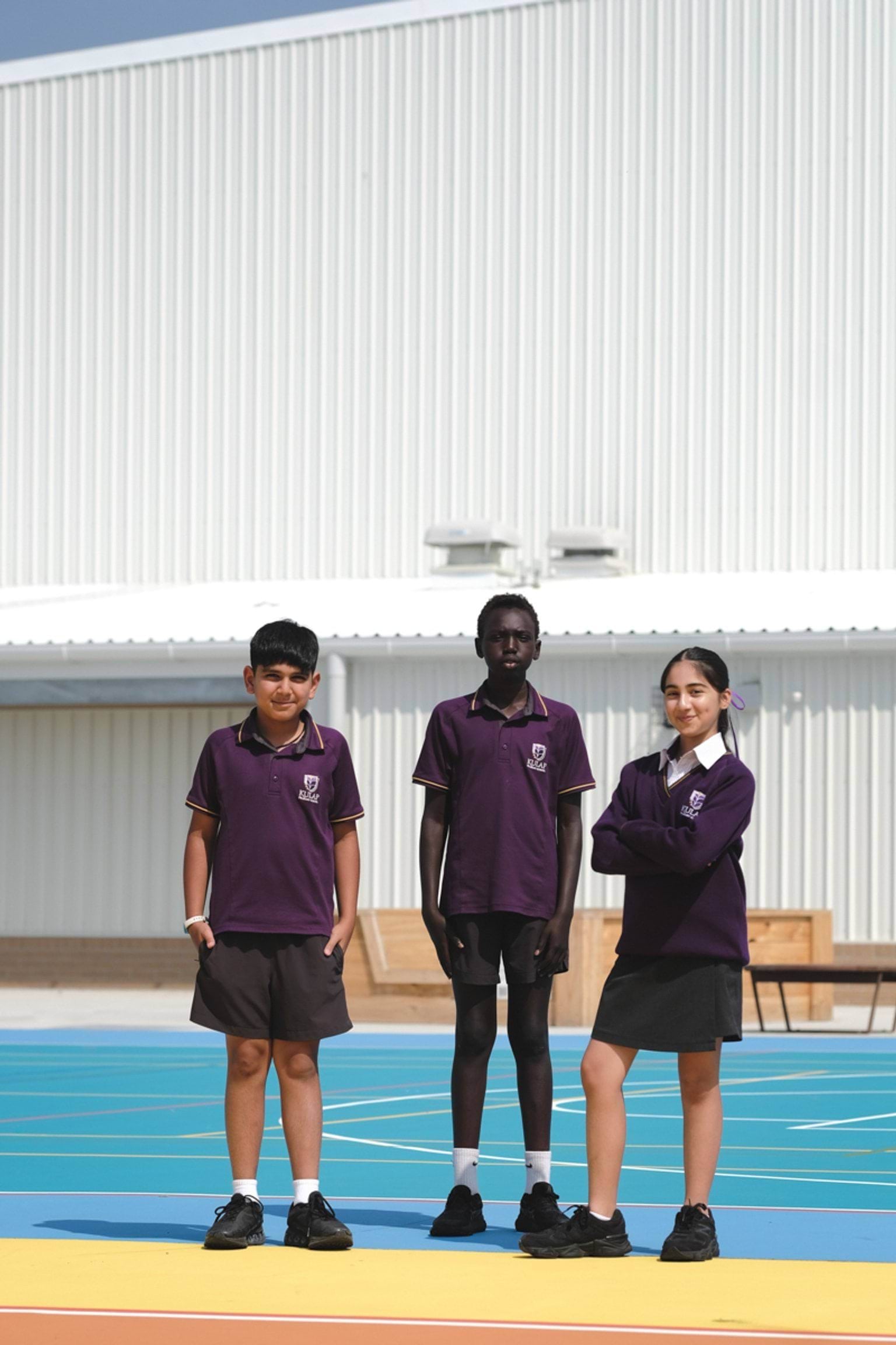 Standing outside the school