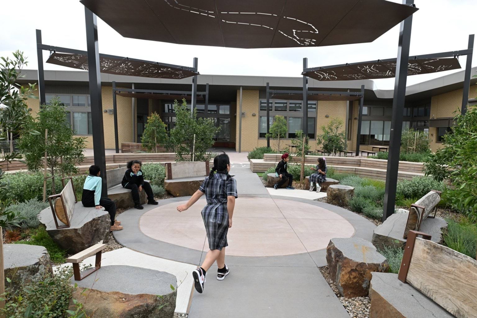Students gather outside for their first day of school