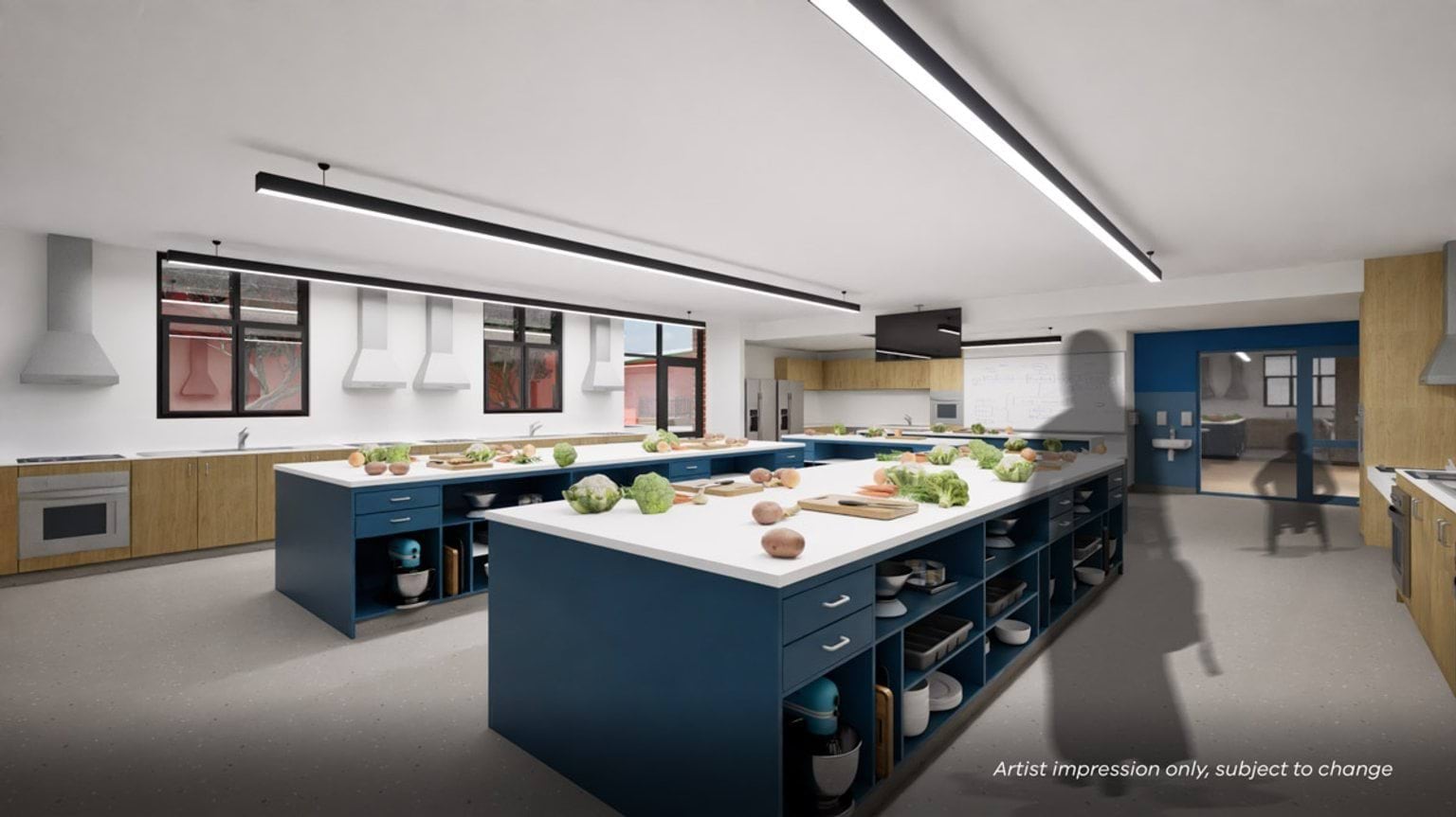 Interior render of a bright teaching kitchen classroom with large prep islands, ovens, sinks, and storage.