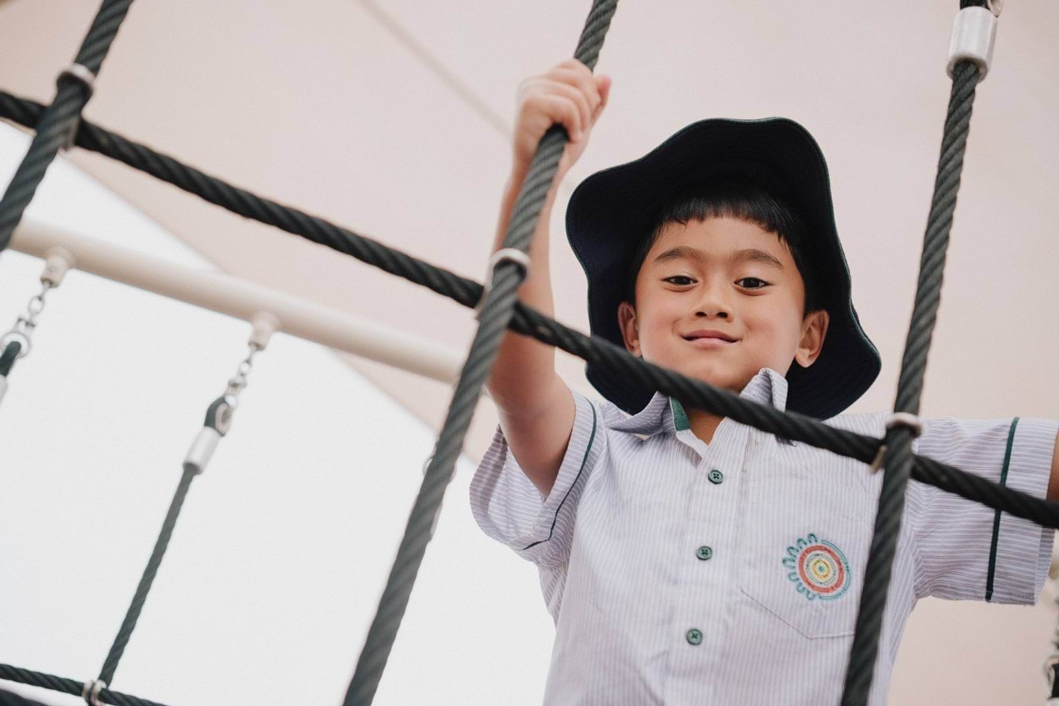 Climbing on the rope bridge