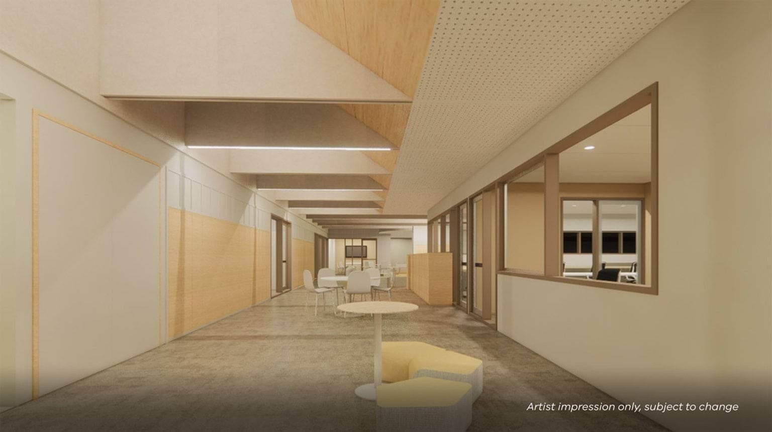 Artist impression of a wide school corridor with tables, chairs, and low seating, lined with timber wall panels and clerestory-style ceiling features.