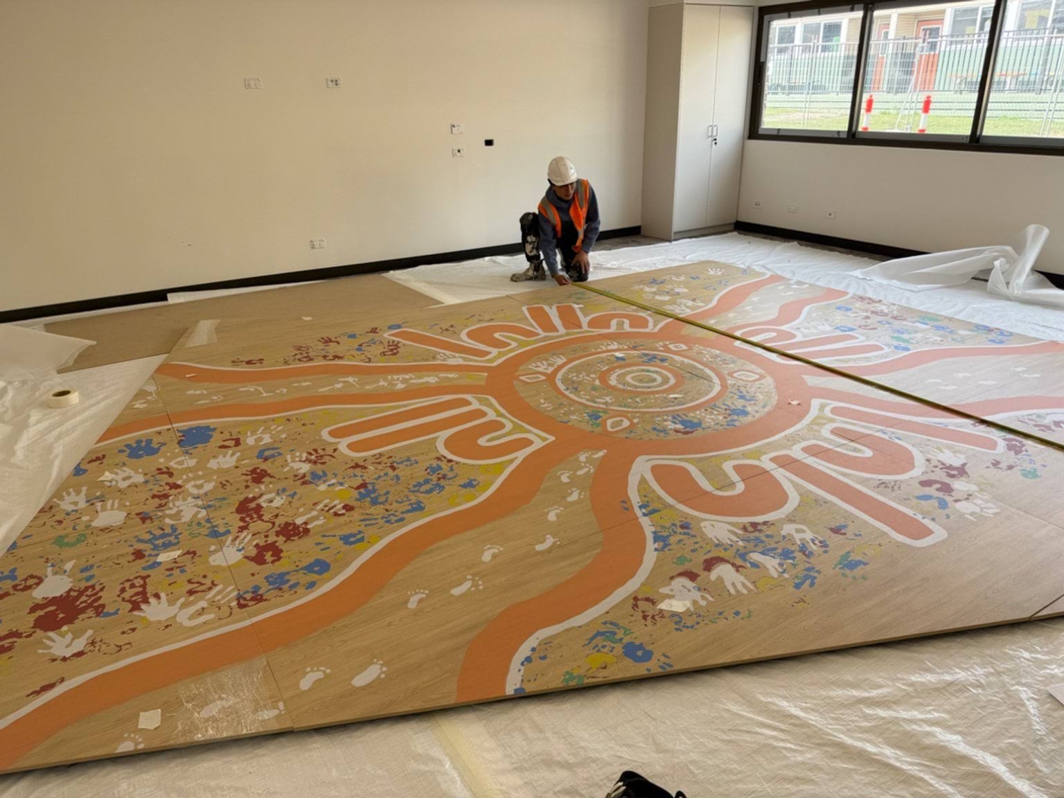 Aboriginal artwork panels being installed