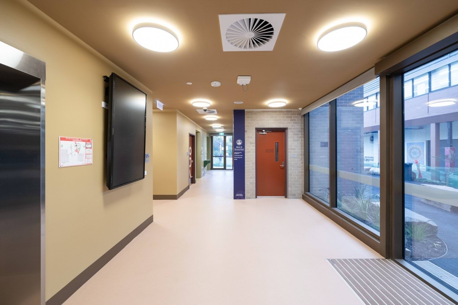 Open walkway with accessible entrance and lift